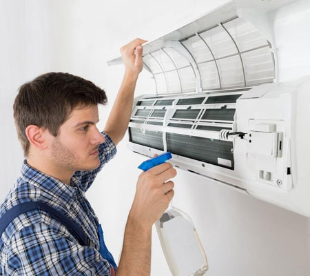 Technician providing AC repair services